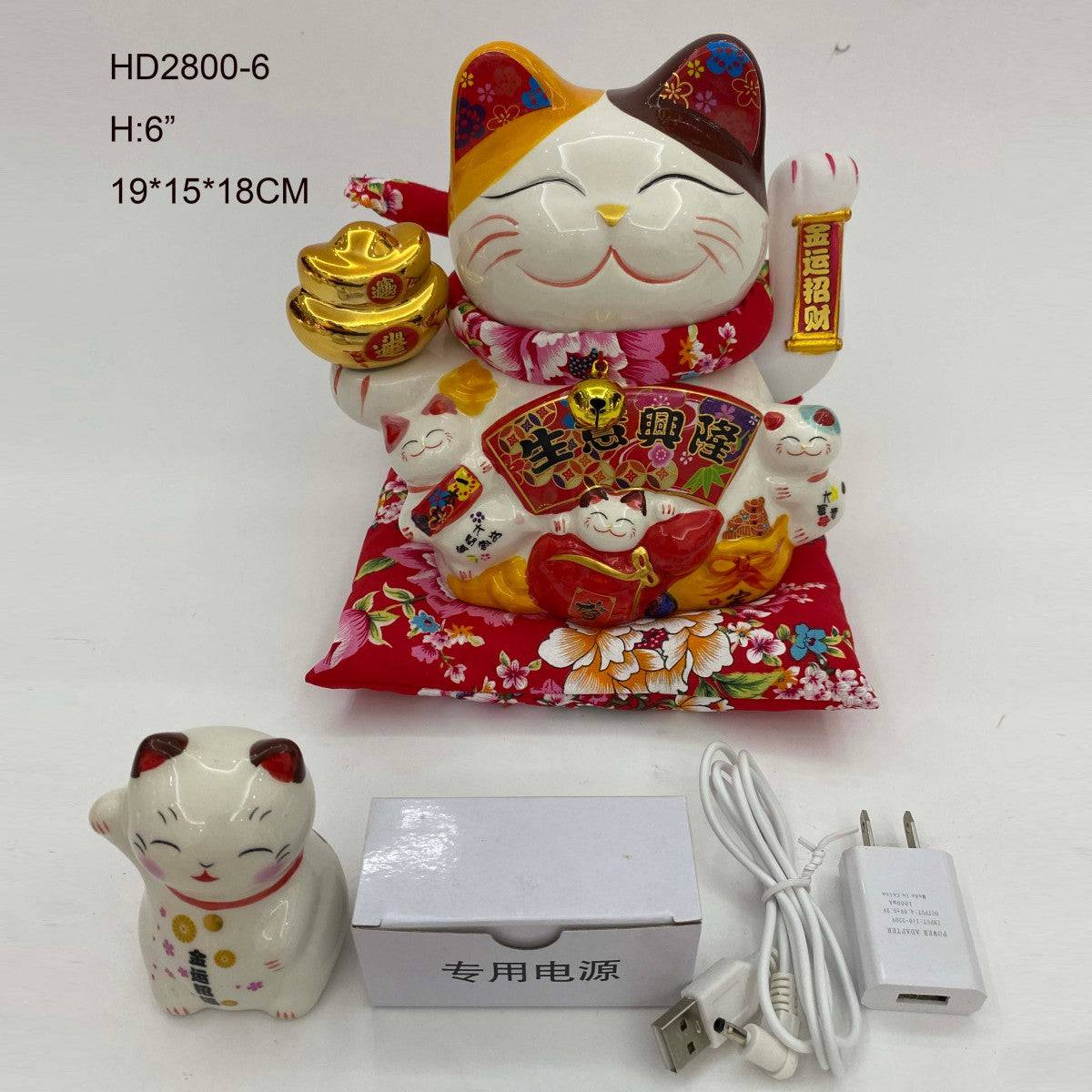 6-inch Lucky Cat Figurine with gold ingots and red floral cushion, includes power adapter. Ideal for home decor and prosperity display.